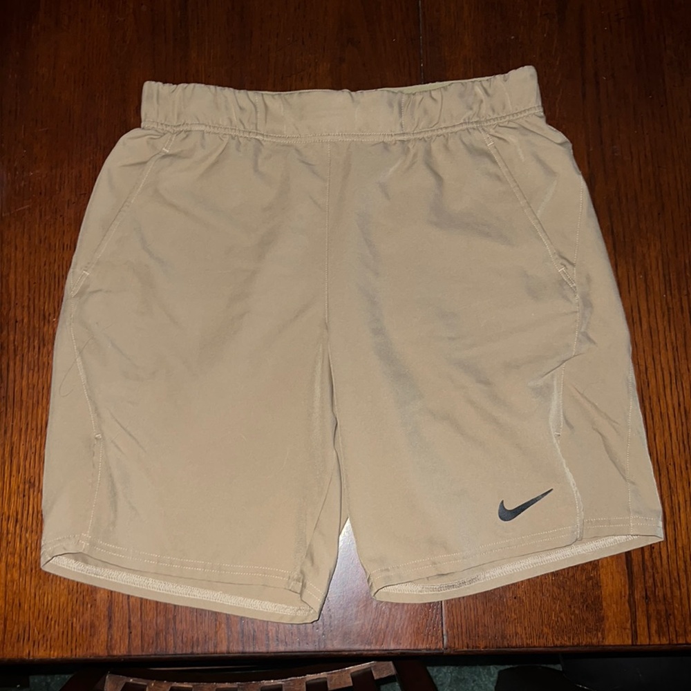 Men’s tan Nike shorts, size medium!